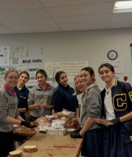 Instagram post: students assembling sandwiches